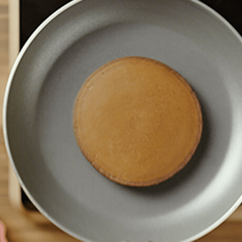 Chocolate pancake in pan