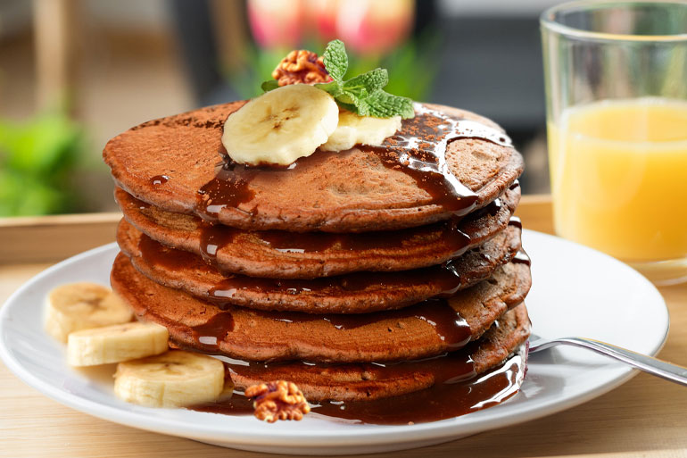 Stacked Chocolate-Pancakes on a plate lifestyle image