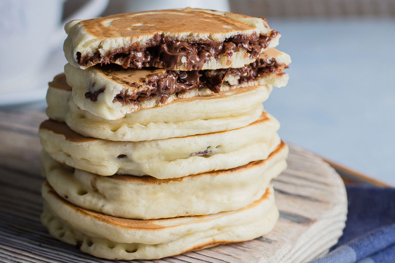 Stacked Stuffed Pancake on a plate lifestyle image