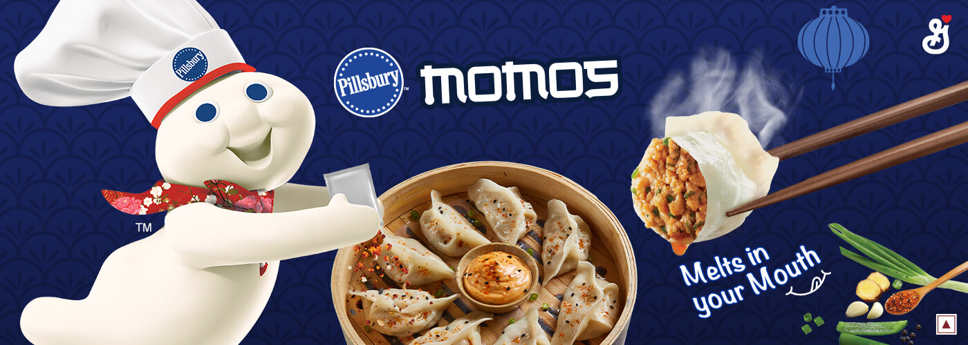 The Pillsbury Doughboy coming out of the side pouring Magic Momo Masala seasoning on a bowl of Momos with the text reading, "Momos, melts in your mouth"