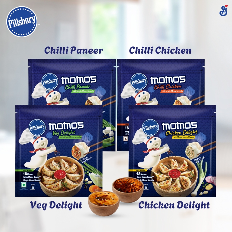 A family shot of Pillsbury India Momos products Veg Delight, Chicken Delight, Chili Powder and Chili Chicken, front of packs
